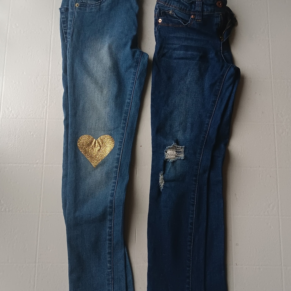 Stylish Women's Blue Jeans with Gold Heart Accent